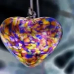 Violet and yellow heart symbolizing long distance love quotes.