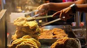 street vendors selling fried chicken