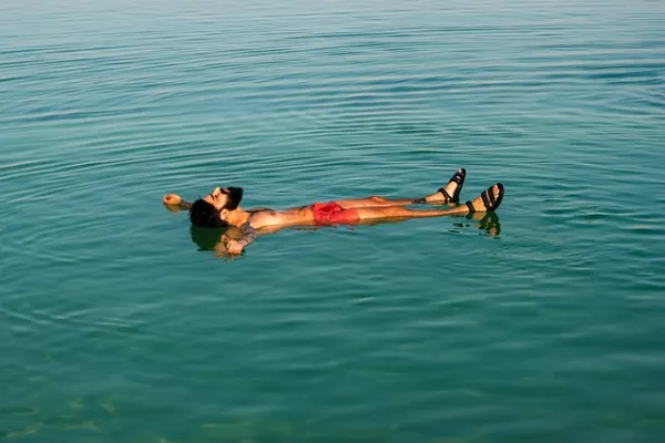 People floating in the Dead Sea in Jordan