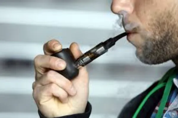 a man smoking Vape Pipe 