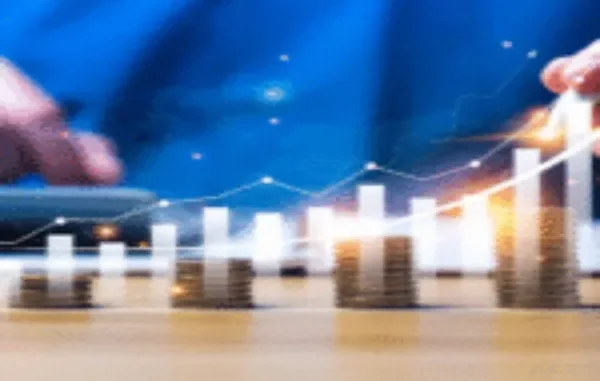 Charting Your Financial Growth Stacks of coins forming an upward trend with overlaid financial charts and blurred hands analyzing data.