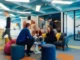 People collaborating in a modern, activity-based office setting, discussing ideas in a comfortable lounge area.