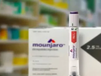 Mounjaro pre-filled injection pen, with the Mounjaro packaging box visible in the blurred background, representing treatment for type 2 diabetes.