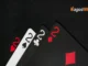 Four playing cards showing the number two in different suits with the Nagad88 logo on a dark background.