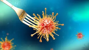 A stylized, three-pronged fork pierces a spiky, round virus particle, with other blurred virus particles in the background, symbolizing how a "stomach bug" can disrupt the gut.