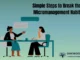 Two women sitting at a desk, one speaking with animated hands and the other listening intently while taking notes, with speech bubbles above their heads, illustrating a coaching or discussion session.