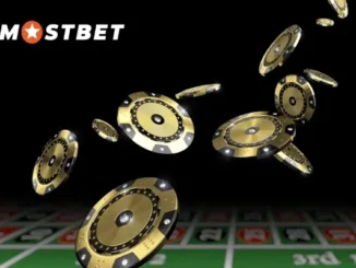 Digitally rendered image of gold and black casino chips in mid-air above a blurred roulette table, with the "MOSTBET" logo visible, representing the element of risk and potential winnings in sports betting.