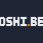 A pixelated logo with white blocky letters spelling "TOSHI.BET" on a dark background, with a small orange square replacing the dot on the "i".