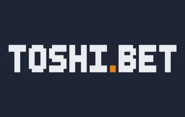 A pixelated logo with white blocky letters spelling "TOSHI.BET" on a dark background, with a small orange square replacing the dot on the "i".