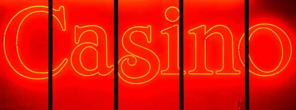 A red neon sign with the word "Casino" lit up.
