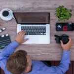 A dark, moody banner graphic with the words "CYBER SECURITY" in fragmented, white text, overlaid with broken glass, symbolizing the protection of digital work against threats.