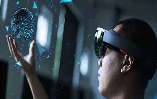 A person wearing an advanced AR headset interacting with a glowing, holographic digital globe suspended above their hand, representing the future of interactive live dealer technology.