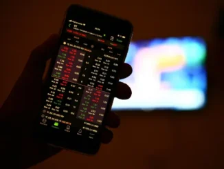 A professional mobile trading app interface showing real-time stock charts, technical indicators, and option chain data for intraday trading in India.