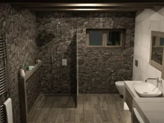 A sleek, floor-to-ceiling custom glass shower partition in a rustic bathroom with stone walls and wood-plank flooring.