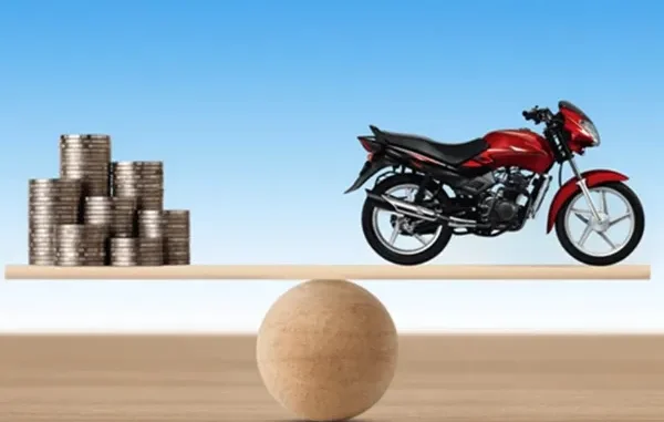 A conceptual image showing a stack of silver coins on one side of a balance scale and a red motorcycle on the other, representing the financial balance of a bike loan.