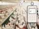 A VEIT BAT2 Connect digital poultry scale displaying an average broiler weight of 823 grams inside a large commercial chicken house.