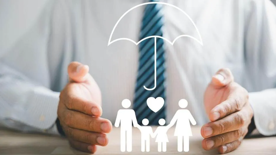 A conceptual image featuring white icons of a family under an umbrella, framed by a person's hands in a protective gesture, symbolizing medical insurance coverage.