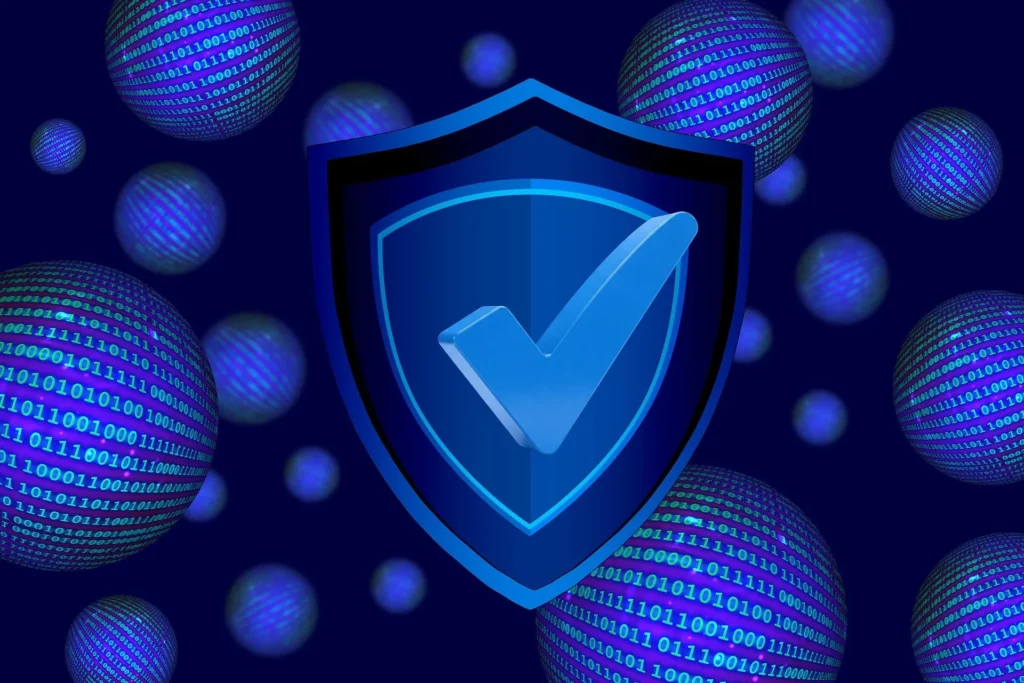An abstract digital 3D illustration featuring a large blue security shield with a checkmark, surrounded by floating spheres covered in glowing binary code, representing data protection in a complex, growing network.