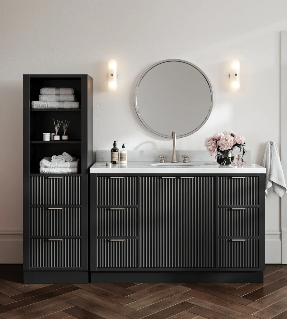 ARIEL Bath black fluted bathroom vanity with marble countertop and matching moisture-resistant tall linen cabinet storage tower.
