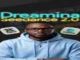A man wearing glasses and a light blue hoodie standing in front of a video editor timeline, flanked by the CapCut and Dreamina app icons under glowing text that reads "Dreamina Seedance 2.0".