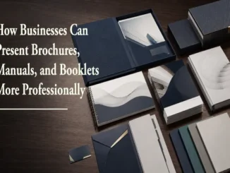 A collection of elegantly designed corporate brochures, spiral-bound manuals, presentation folders, and booklets arranged neatly on a dark wooden desk.
